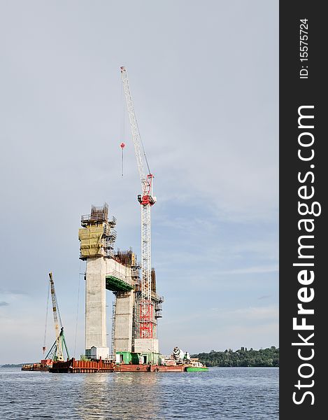 Building reinforced concrete bridge with highway on Dnepr river. Building reinforced concrete bridge with highway on Dnepr river