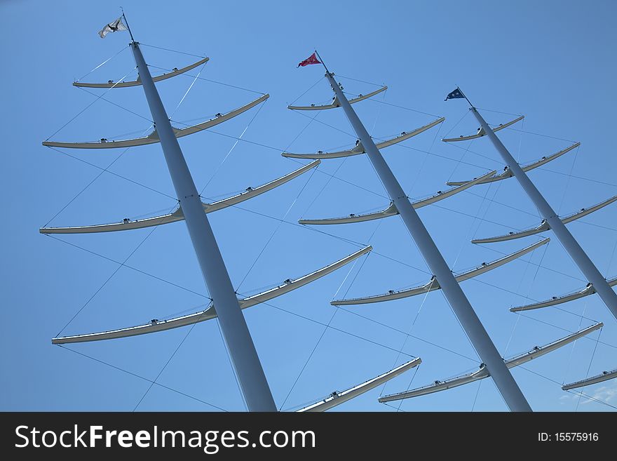 Masts in blue sky. Greece