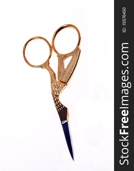 Gold Sewing Scissors isolated on white