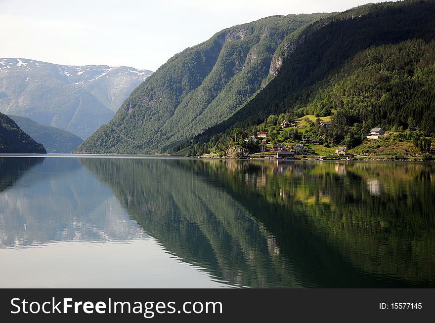 Reflections In Hardangerfjord, Norway
