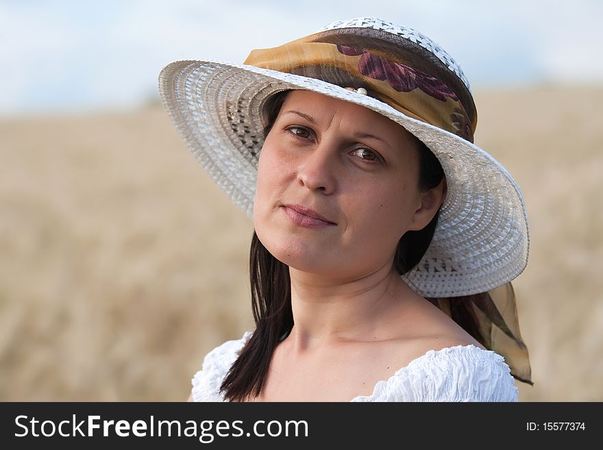 Portrait of lady in white hat. Portrait of lady in white hat