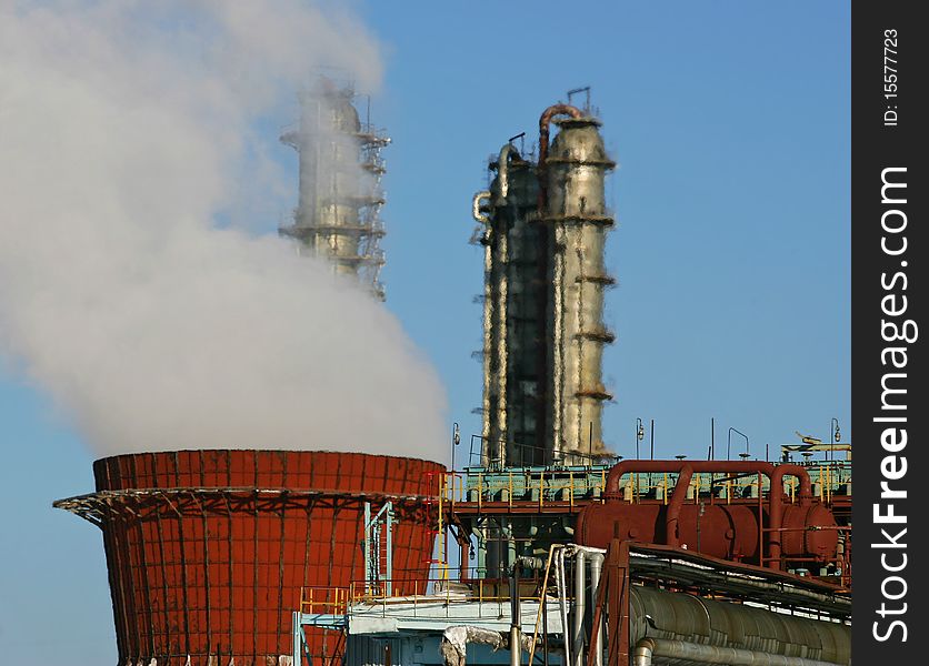 Refinery factory against the dark blue sky