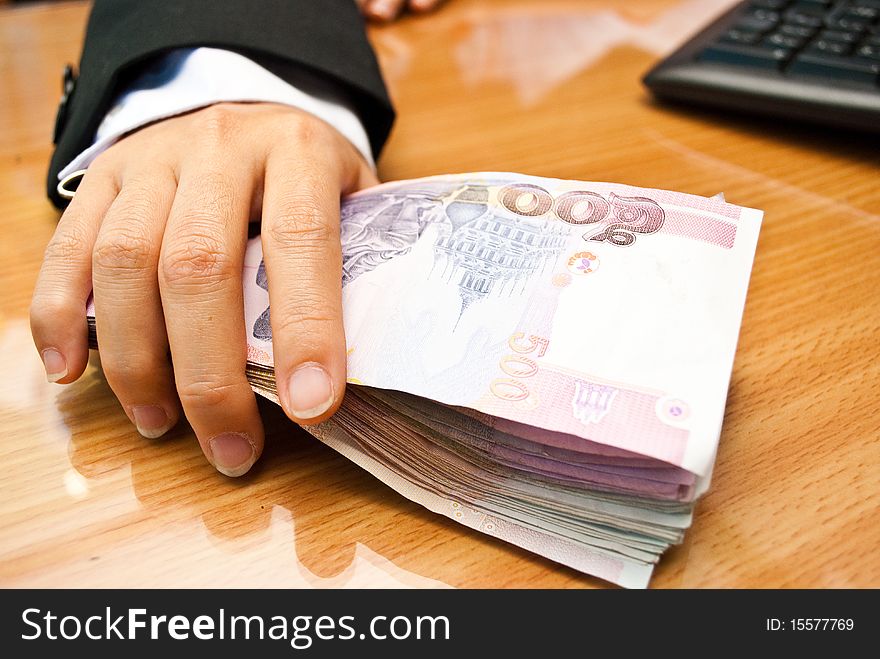 Businessman’s Hand Holding Money. Businessman’s Hand Holding Money