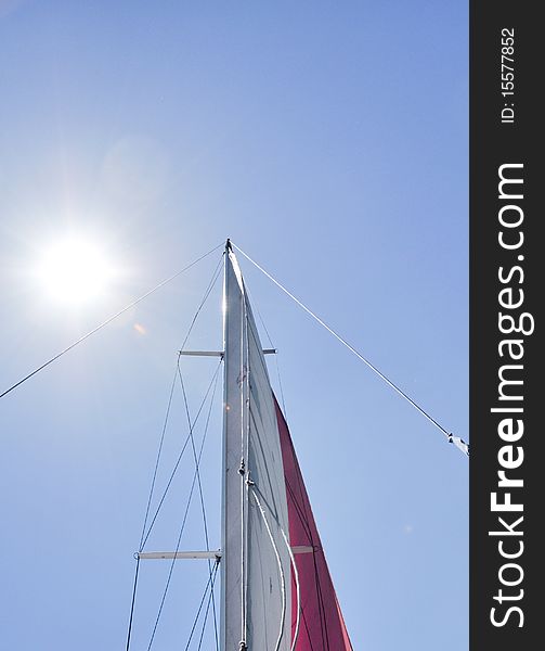 Looking up at sails and mast of boat. Looking up at sails and mast of boat.