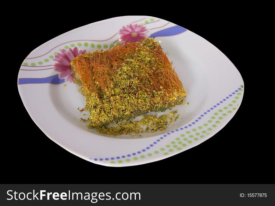 Turkish dessert kadayif made from pulp and pistachio. Turkish dessert kadayif made from pulp and pistachio