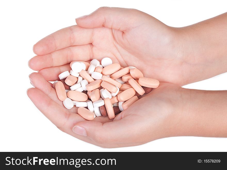 Medical Pills In A Female Hand, Isolated