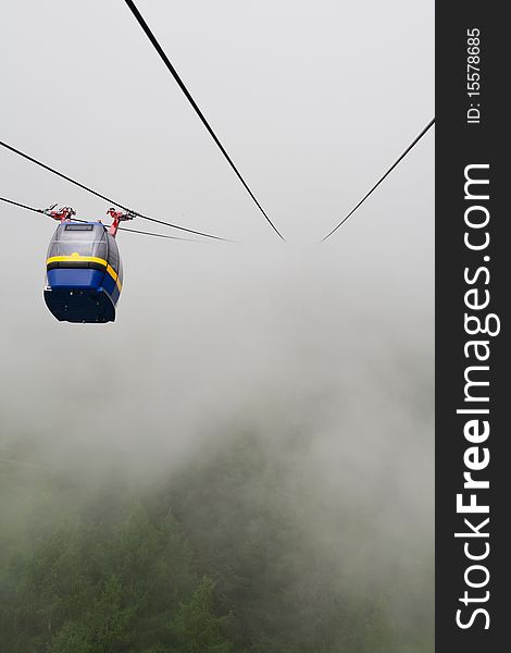 Cableway hidden in mist leading to Kitzsteinhorn and Kaprun. Cableway hidden in mist leading to Kitzsteinhorn and Kaprun.