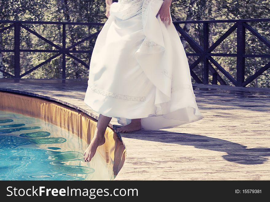 The girl in a wedding dress under water. The girl in a wedding dress under water