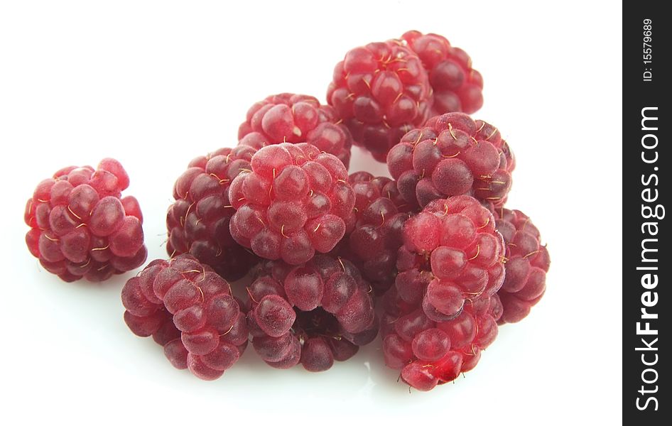 Ripe berry of a raspberry close up on a white background. Ripe berry of a raspberry close up on a white background