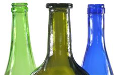 Three Colored Bottles Stock Images