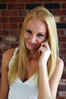 Young Female Talking On Cell Phone Outdoors Stock Image Young Female Talking On Cell Phone Outdoors Stock Image