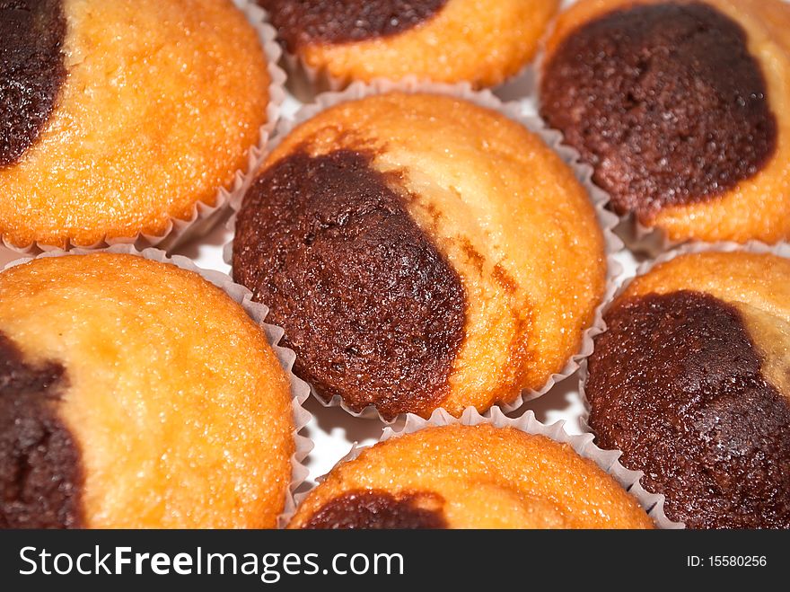 Caption of homemade muffins in the owen plate