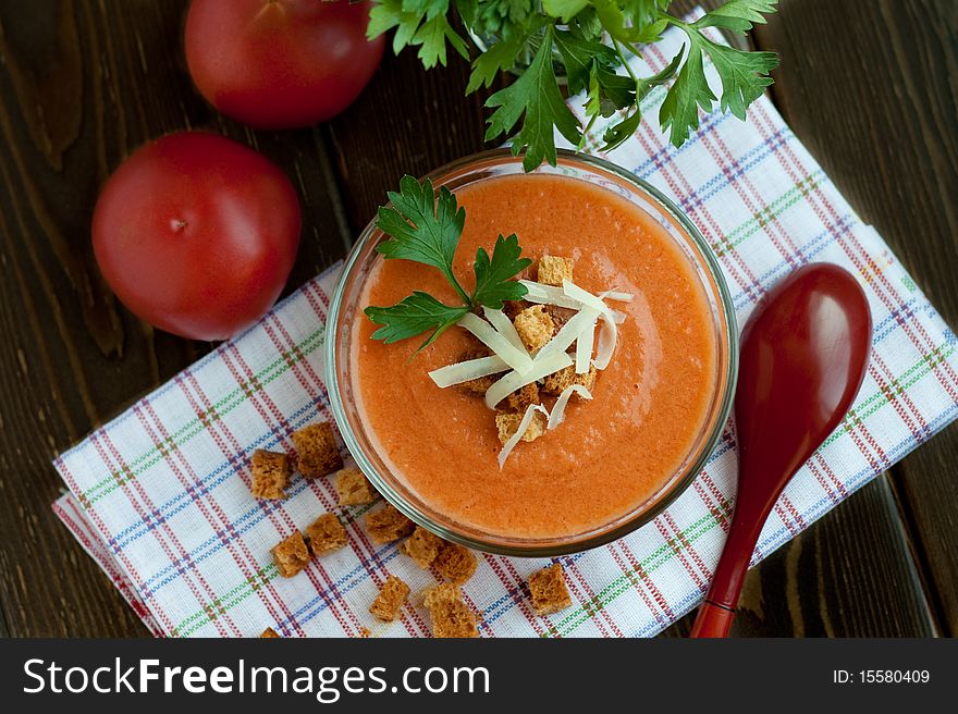 Gaspacho (tomato soup) with parmesan and parsley