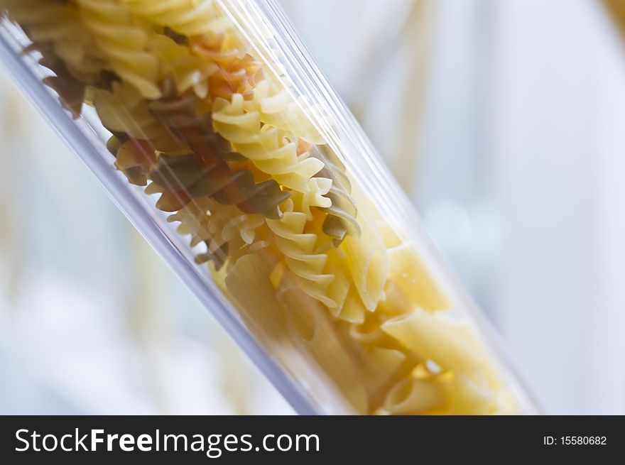 Italian pasta in glass tube