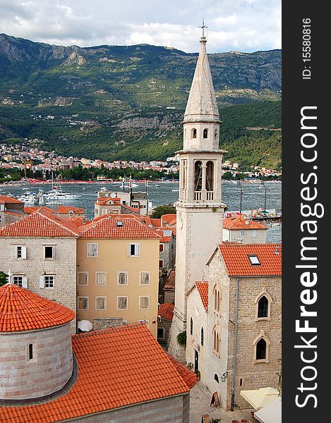 The Old Town of Budva with church of St. John The Baptist and the Church of the Holy Trinity with Iconostasis in Montenegro. The Old Town of Budva with church of St. John The Baptist and the Church of the Holy Trinity with Iconostasis in Montenegro