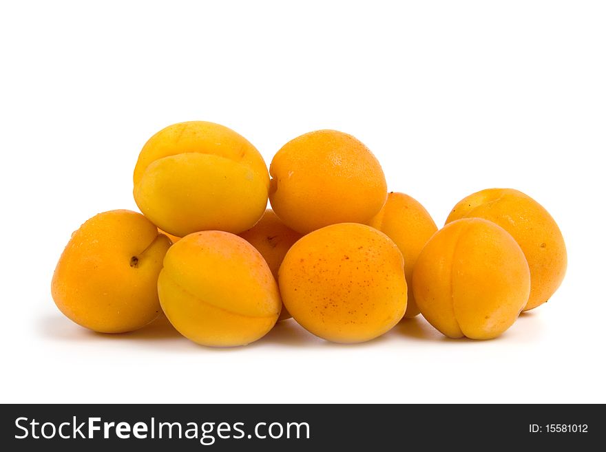 Ripe apricots isolated on a white background