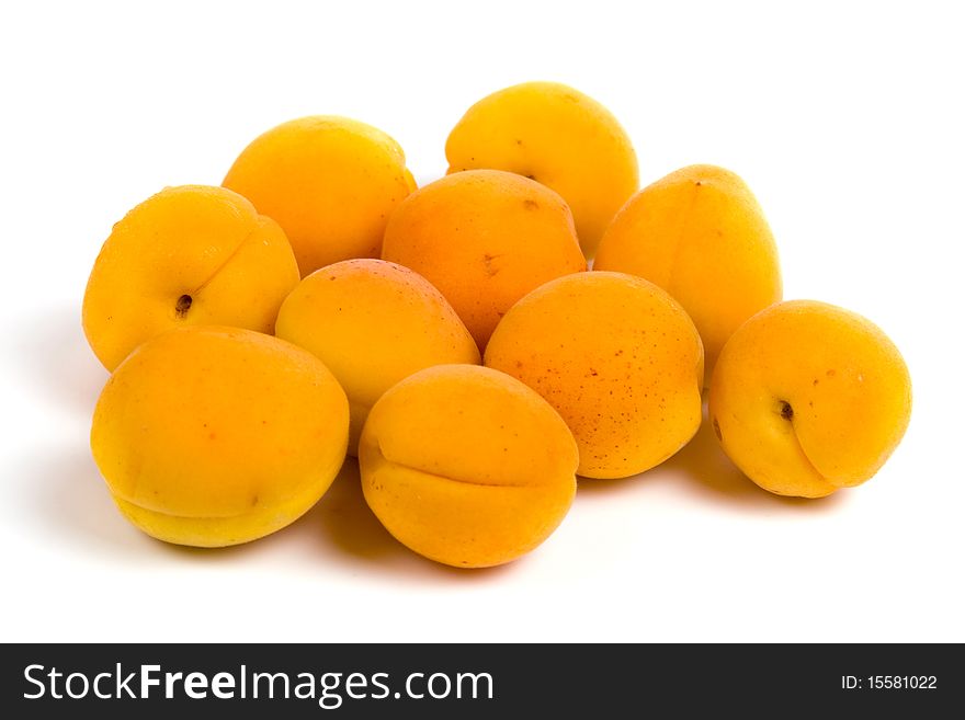 Ripe apricots isolated on a white background