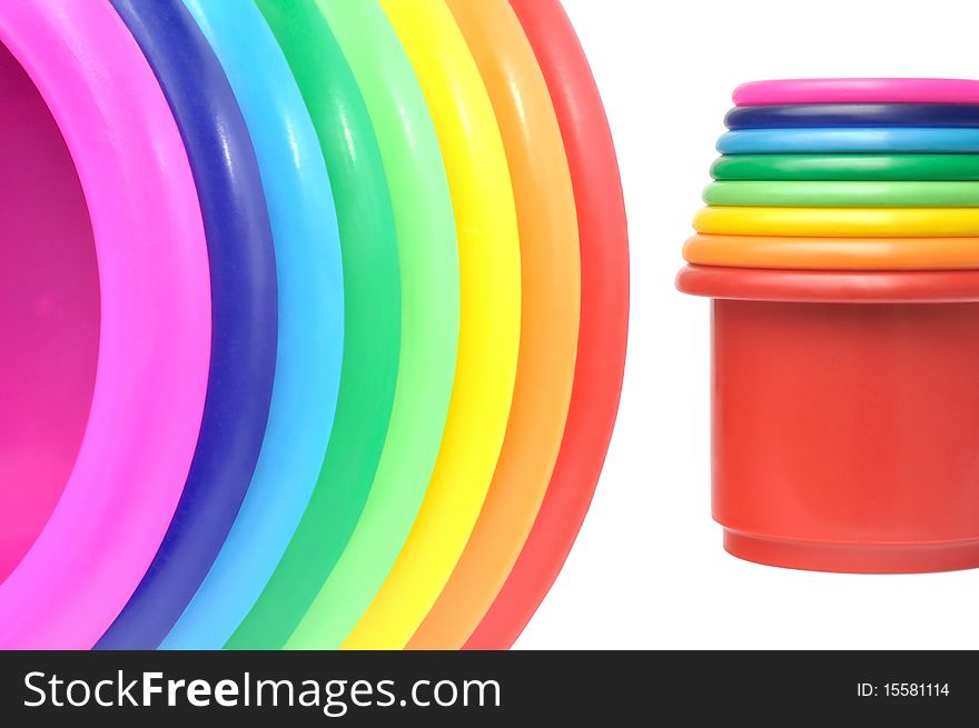 Colored plastic flower pots against white background. Colored plastic flower pots against white background