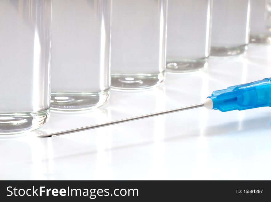 Single use syringe against white background