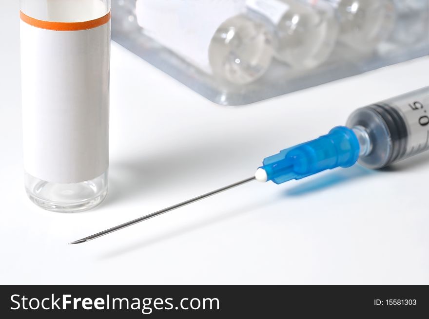 Single use syringe against white background