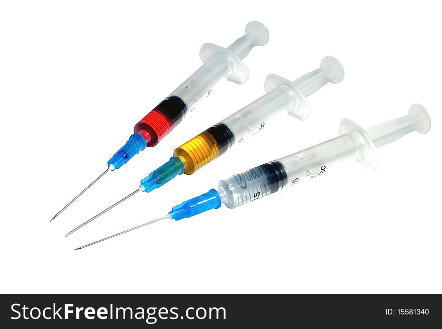 Three disposable plastic syringe against white background. Three disposable plastic syringe against white background
