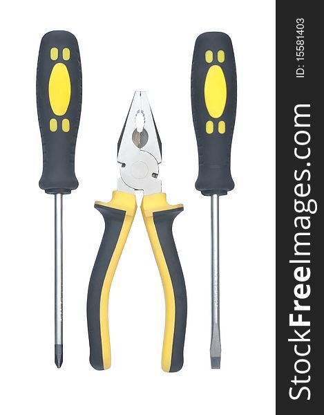 Pliers and two screwdrivers against white background. Pliers and two screwdrivers against white background