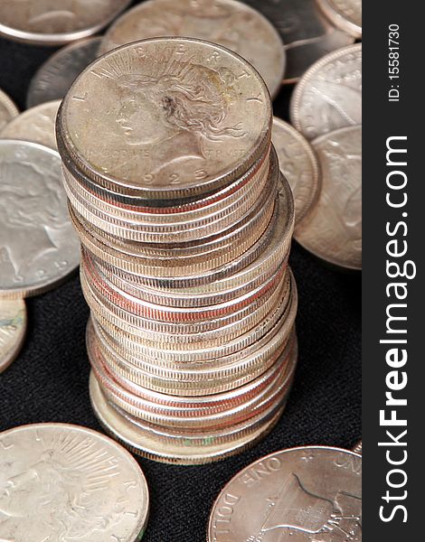 Focus On The Top Of A Stack Of Silver Dollars