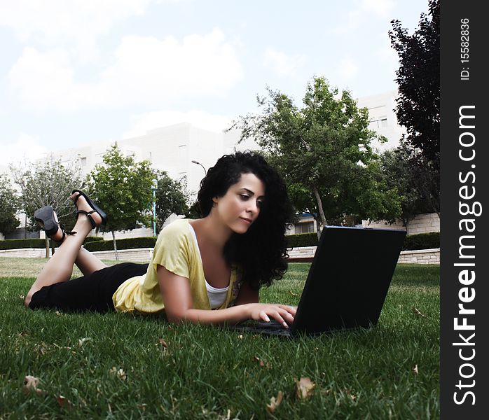 Beautiful young woman with laptop