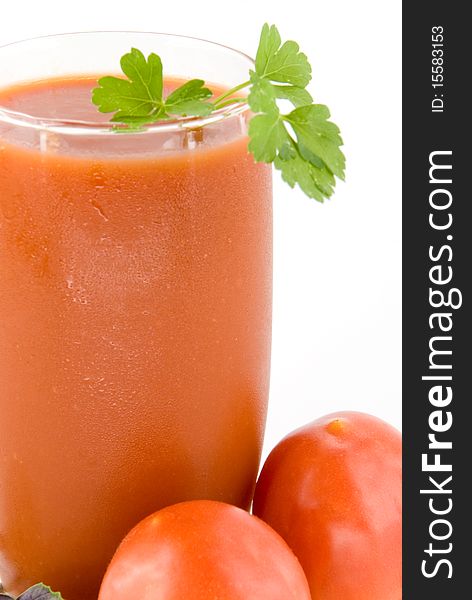Small tomatoes and juice on white background. Small tomatoes and juice on white background