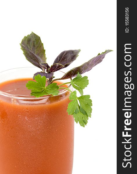 Tomato juice and greens on white background