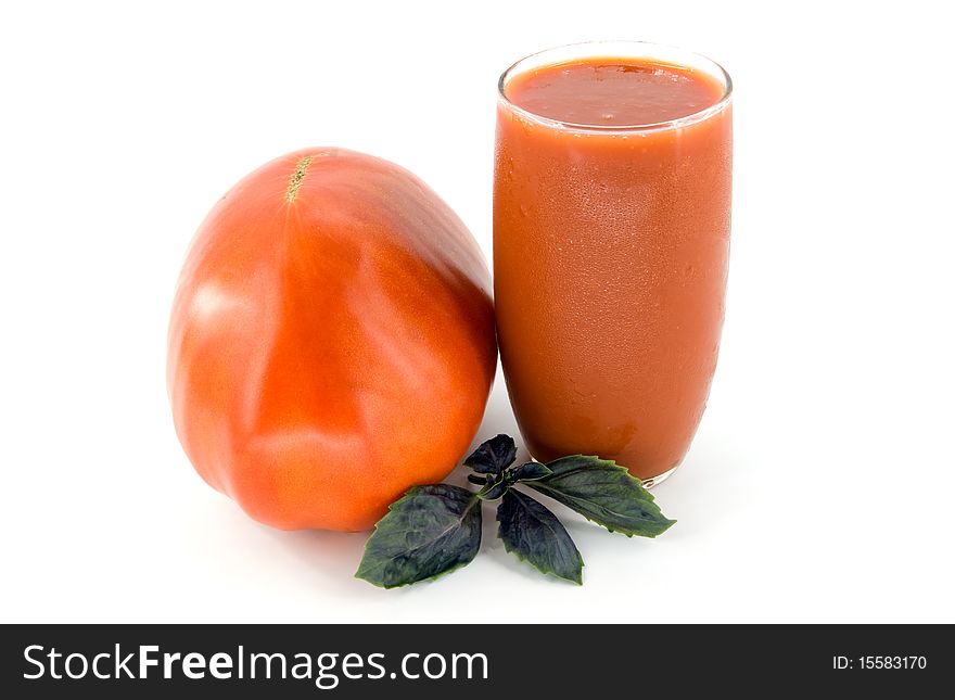 Big tomato and juice on white background. Big tomato and juice on white background