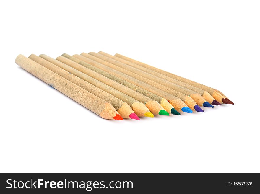 Wooden color pencils isolated on a white background