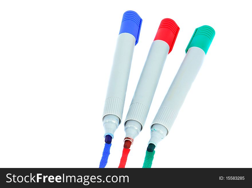Three colored markers isolated on white background. Three colored markers isolated on white background
