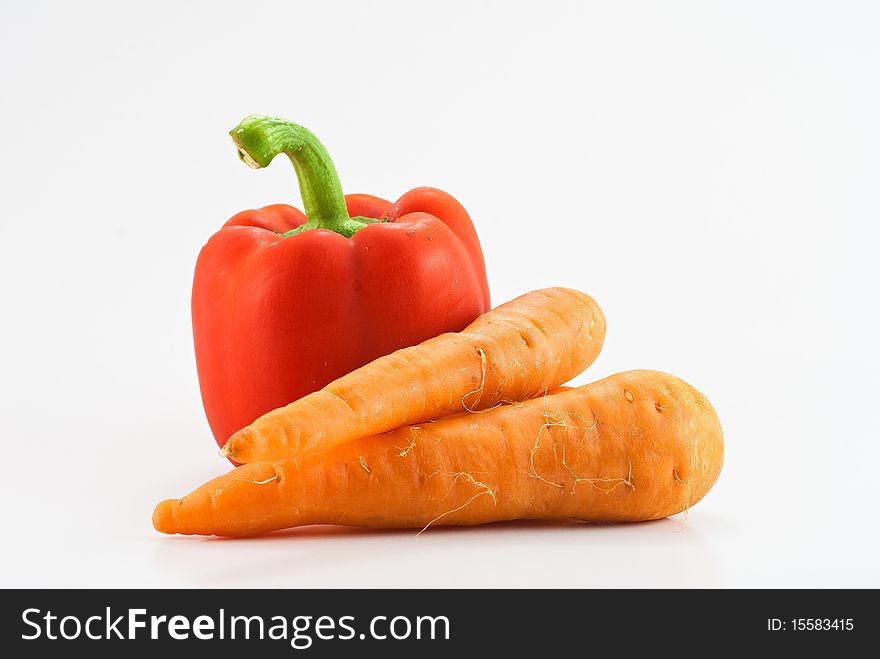 Bell pepper and carrot isolated on white