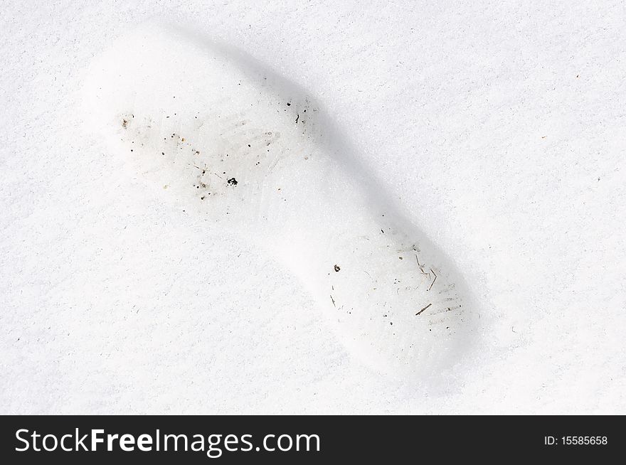 Shoe foot print on the snow
