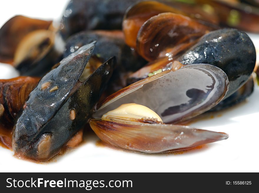 Cooked and opened organic mussel ready to eat