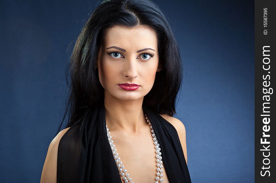 Portrait of elegant beautiful woman wearing jewelry.