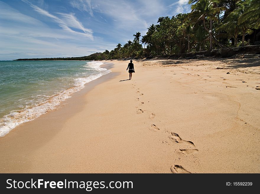 Girl Walking on a Beach
