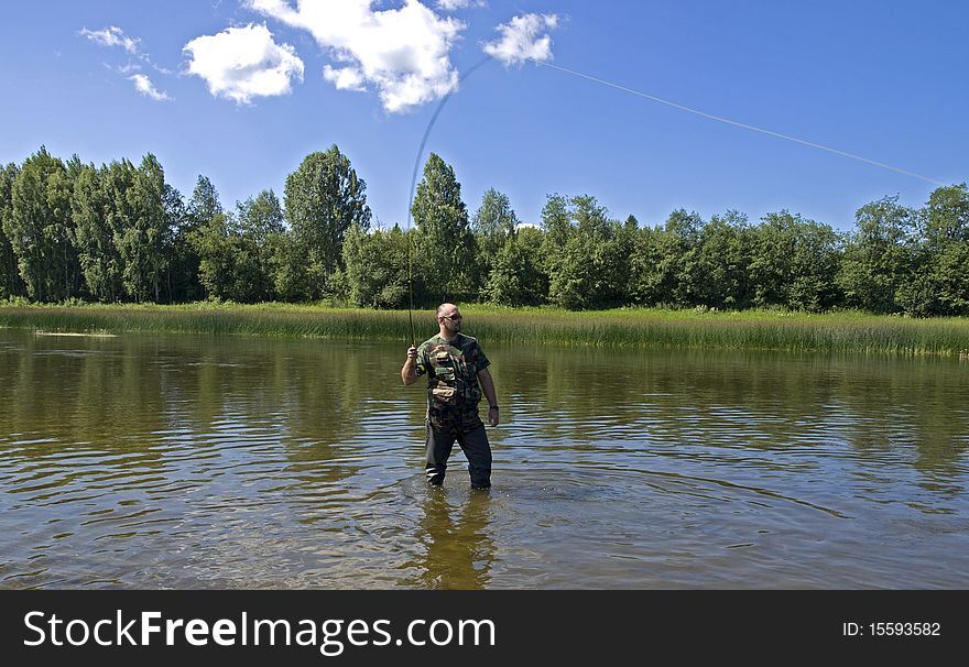 Photo of the fisherman on the river