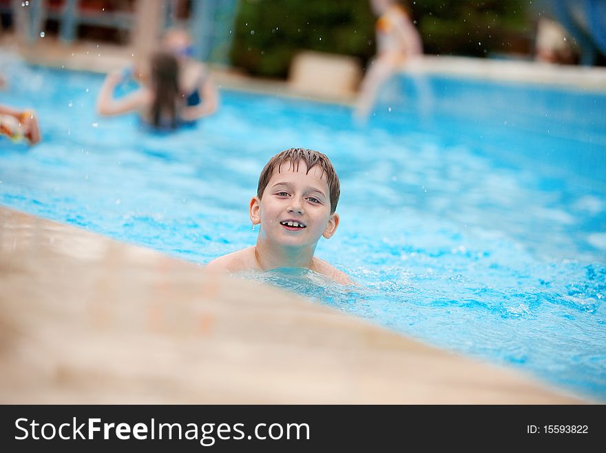 Little swimmer in the swimming pool. Little swimmer in the swimming pool