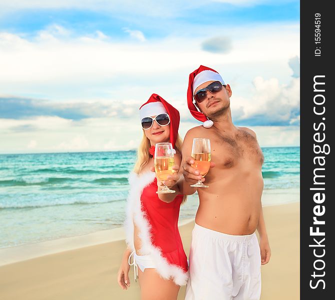 Couple celebrates Christmas at the tropical beach