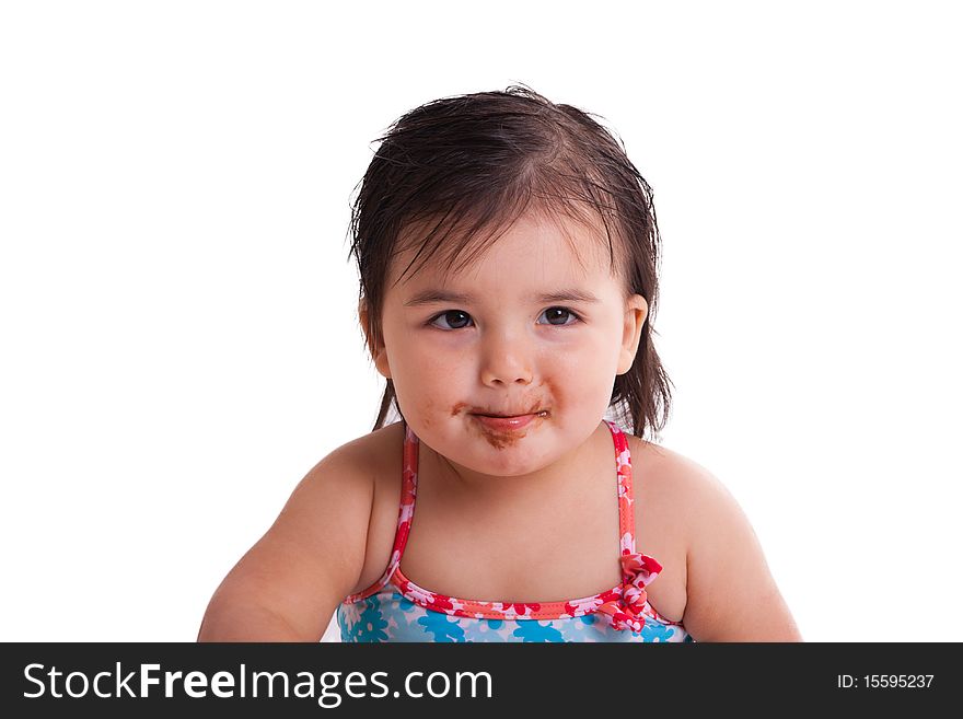 Portrait of a child with chocolate lips