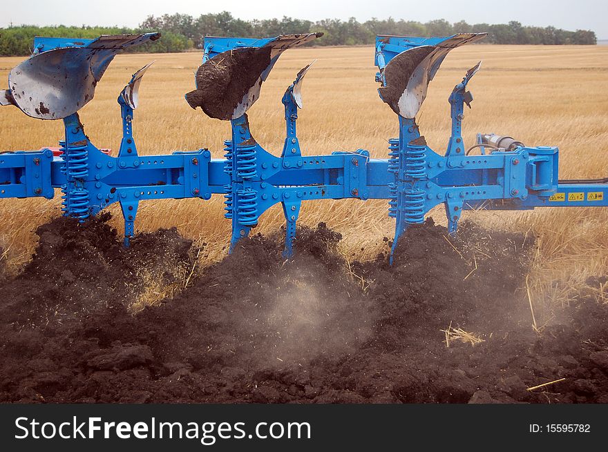 Workable plow with soil on furrows.