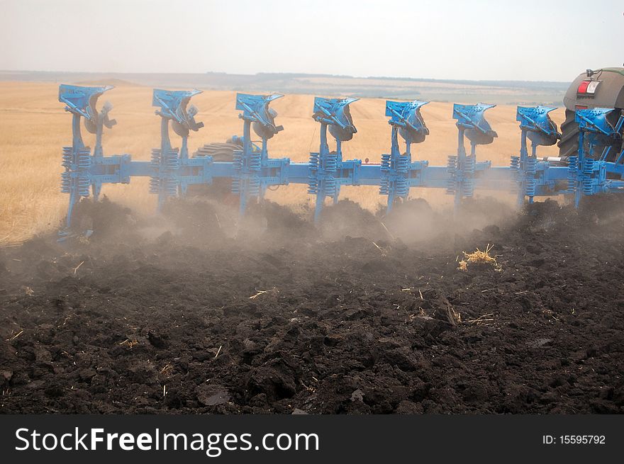 Workable plow with soil on furrows.