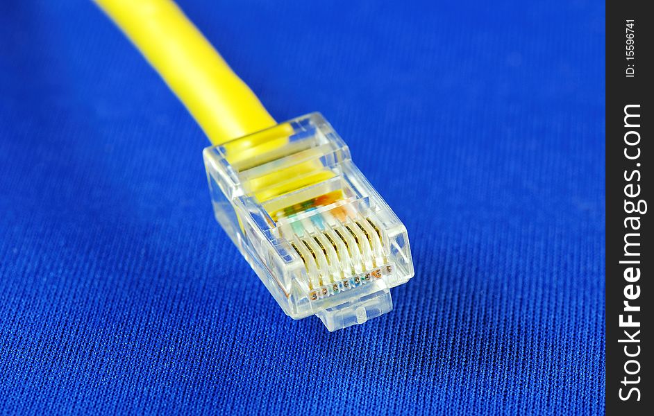 Close-up view of the yellow Ethernet (RJ45) cable