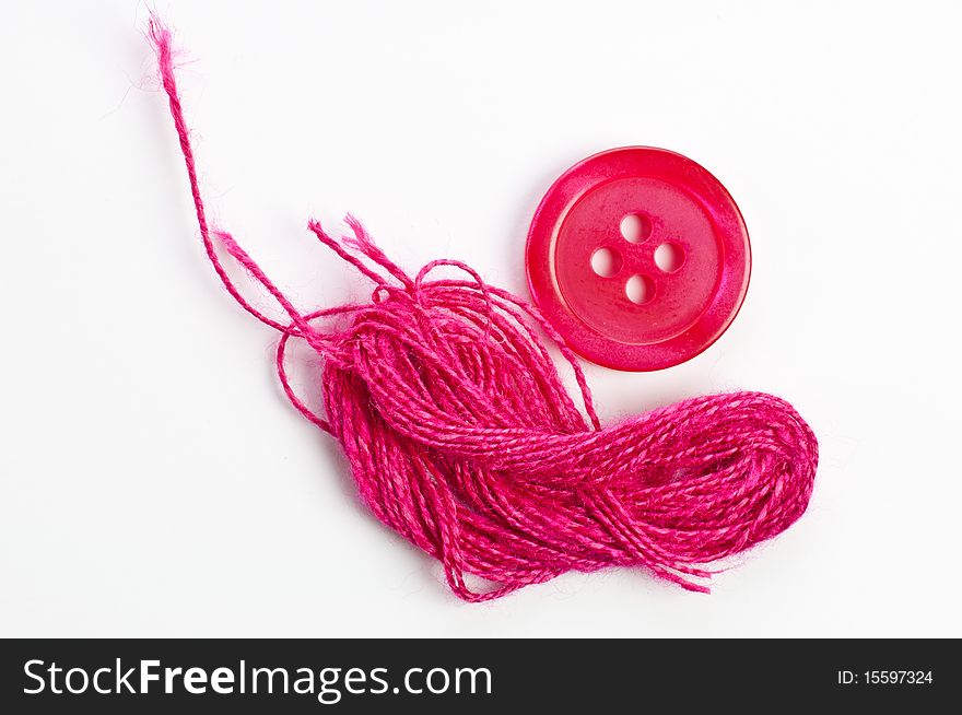 Extra button and spare yarn. Extra button and spare yarn