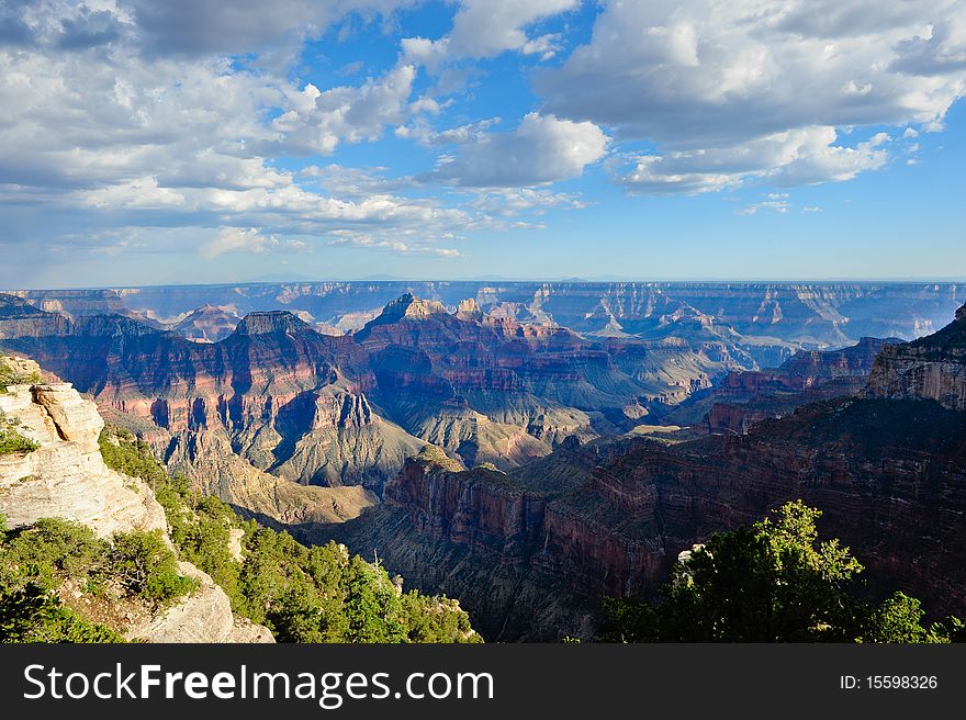 Shadows moving over the North Rim of the the Grand Canyon. Shadows moving over the North Rim of the the Grand Canyon