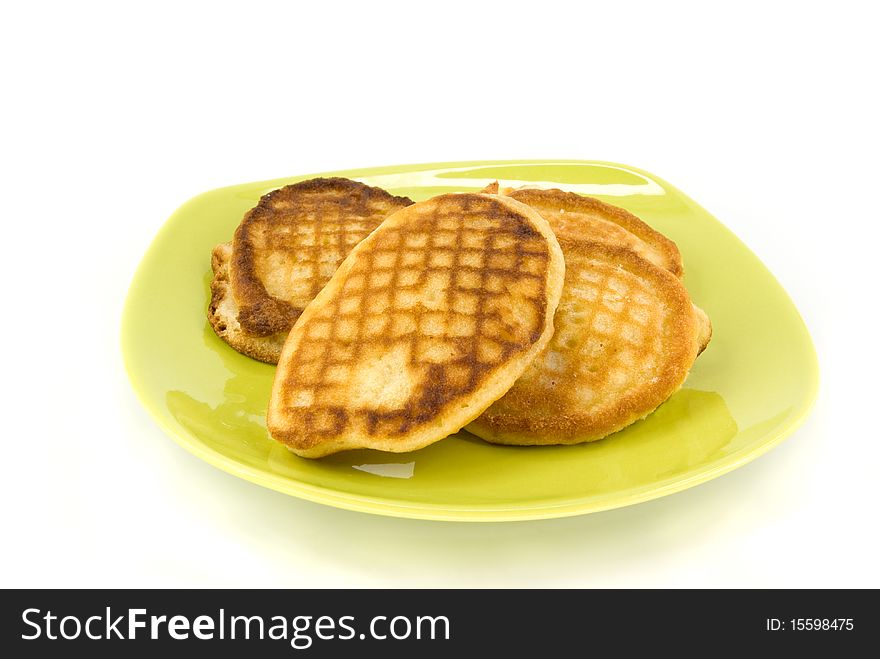 Thick pancake on green plate