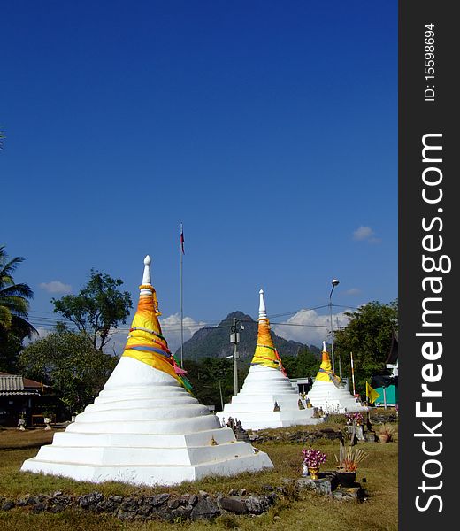 White big pagpda in thai village in bule sky. White big pagpda in thai village in bule sky