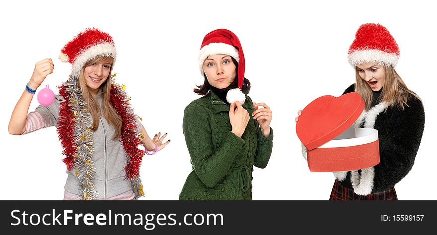 Three girls in christmas hat with gift on white background